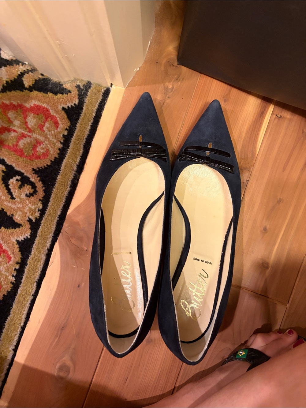 Butter Navy Suede Pointed-Toe Flats with Black Bow Accent